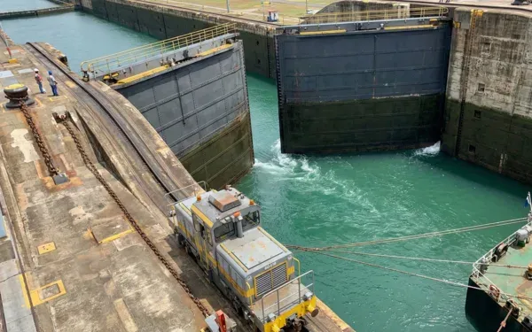 Miraflores lock gates with a ship moving through the canal