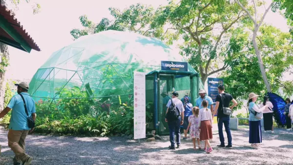 Visitors outside the butterfly dome at Punta Culebra Nature Center