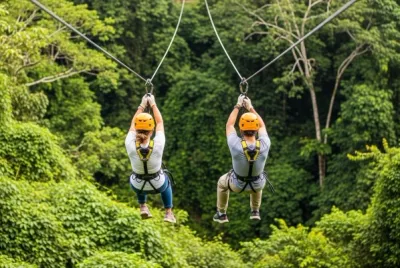 Canopy zip-line ride through the forest at La Granja Camp and Adventure